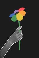 Trendy halftone collage on dark background. Hand holding a flower with LGBT emblem. Gender, diversity, unity concept. flat illustration for poster vector