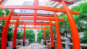 Ginsekai Inari Shrine is a shrine located in the corner of Shinjuku Park Tower, Nishi-Shinjuku, Shinjuku-ku, Tokyo, Japan. This whole area was the residence of a certain feudal lord during the Edo photo