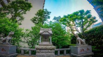 Ginsekai Inari Shrine is a shrine located in the corner of Shinjuku Park Tower, Nishi-Shinjuku, Shinjuku-ku, Tokyo, Japan. This whole area was the residence of a certain feudal lord during the Edo photo