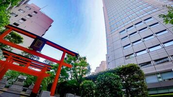 Ginsekai Inari Shrine is a shrine located in the corner of Shinjuku Park Tower, Nishi-Shinjuku, Shinjuku-ku, Tokyo, Japan. This whole area was the residence of a certain feudal lord during the Edo photo