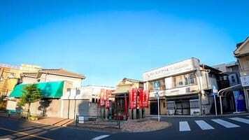 Sumiyoshi Inari, a shrine located at an intersection in Takasago, Katsushika Ward, Tokyo photo