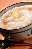 Rice Pudding with cinnamon powder, delicious Brazilian sweet photo