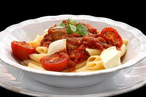 penne with fresh tomato sauce and mozzarella photo