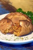 Cod empanada, a classic of Argentine cuisine photo