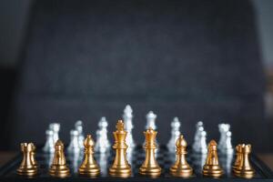 Front view of a chess game on a chessboard with blur foreground. Business game competitive strategy. Space for text. Concept of strategy for business photo