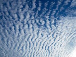 Scenic view landscape of billow clouds and blue sky photo