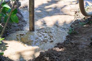 Close-up of workers drilling groundwater until found water. Groundwater solves water shortage problems. Solve the drought photo