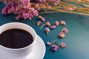 Close-up of traditional British scones on a plate and a tea hot cup with blurred background. Space for text photo