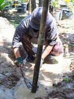 Close-up of workers drilling groundwater until found water. Groundwater solves water shortage problems. Solve the drought photo