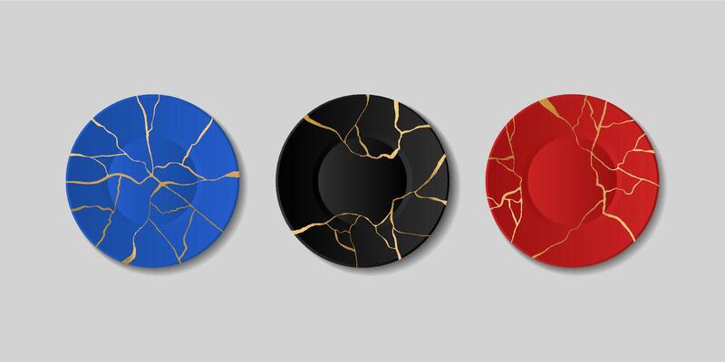 Kintsugi plates, broken plates with golden cracks, japanese art of repair. Repairing cracked pottery with gold, marble pattern plate set. Black and blue and red tableware.