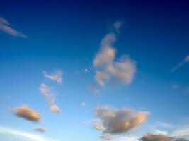 Bright blue sky with clouds. photo