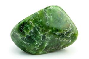 Macro shot of tumbled green Nephrite jade on white background. photo