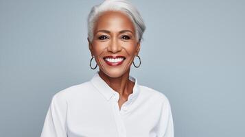 Beautiful senior black woman with glowing healthy skin close-up. Advertising of cosmetics, perfumes, copy space photo