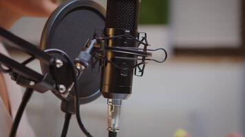 Recording audio at home using professional microphone. Creative online show presenter, On-air online production internet broadcast show host streaming live content, recording digital social media video