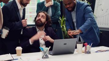 Research team presenting all insight and statistics data they found online, briefing their manager about the work progress and achievements. Employees showing gathered info. Camera A. video