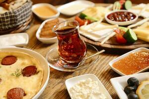 Wooden Table With Plates of Food photo