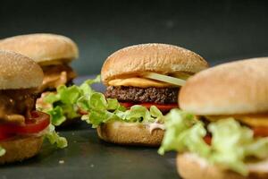 Group of Hamburgers Arranged on Table photo