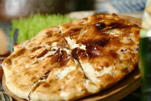 Pizza on Wooden Cutting Board photo