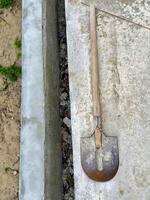 Shovel on Cement Slab photo