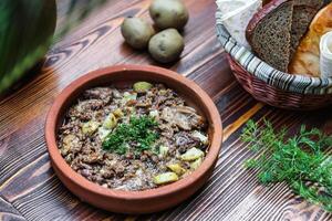 Bowl of Food on Wooden Table photo