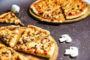 Delicious Pizzas on a Table photo