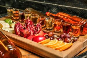 Wooden Tray Filled With Various Types of Food photo