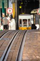 Romantic yellow tramway - main symbol of Lisbon, Portugal photo