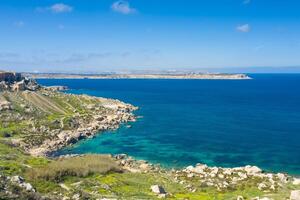 Aerial drone view of rocky coastline and sea. Malta photo