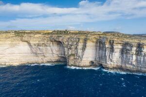 Aerial view of Sea Tunnel near Azure window. Dwejra is a lagoon of seawater on the Gozo island.Malta photo