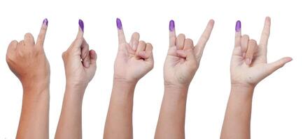 Group of hand showing little finger dipped in purple ink after voting for Indonesia Election or Pemilu with various pose, isolated over white background photo