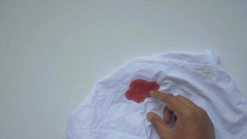 blood stains on a white shirt. video