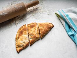 Tasty Arabic baked Pastry isolated on table top view of arabic food photo