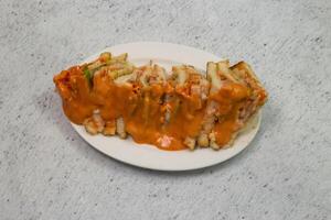 Chicken cheese sandwich served in dish isolated on grey background top view of bangladeshi fastfood photo