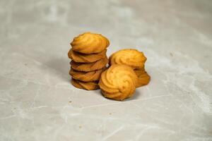 Tasty cookies biscuits topping served on background side view of bakery item photo