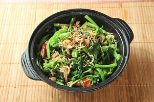 Stir-fried Vegetables with Mala Zhan served in dish isolated of table top view Seasonal Vegetables photo