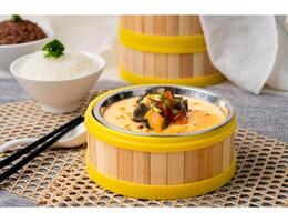 STEAM EGG With CENTURY EGG with chopsticks served in dish isolated on table top view of singapore food photo