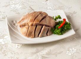 Nanjing Salted Duck served dish isolated on background top view of hong kong chinese food photo