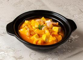 Boiled Tofu with Shrimp and Pumpkin served bowl isolated on background top view of hong kong chinese food photo