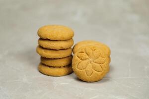 Tasty Sugar cookies biscuits topping with peanut served on background side view of bakery item photo