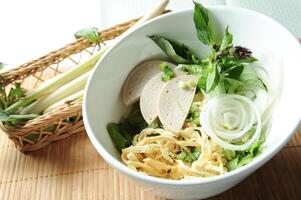 Shredded Chicken Broth Powder served in bowl isolated on table top view of Soup photo