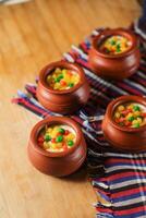 Moondi rabri milk kheer served in pot isolated on mat top view of indian, bangali and pakistani dessert mithai photo