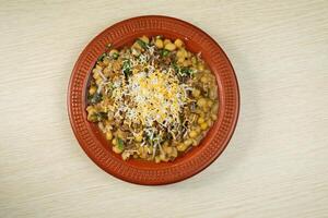 Spicy chotpot masla chaat with chana, chola, chilli served in dish isolated on table top view of indian, bangladeshi and pakistani street food photo