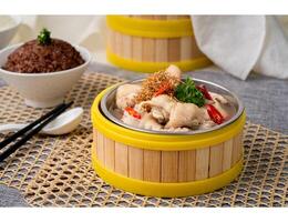 STEAM CHICKEN With MINCED GINGER with chopsticks served in dish isolated on table top view of singapore food photo