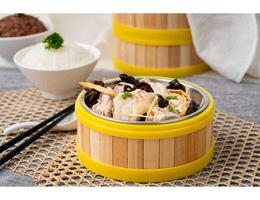 STEAM CHICKEN With FUNGUS and DRIED LILY FLOWER with chopsticks served in dish isolated on table top view of singapore food photo