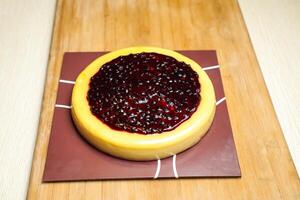 Blueberry Cheesecake include caramel isolated on table top view of cafe bake food photo