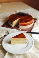 Mocha cake slice include chocolate, cream, sugar with knife and fork served in plate side view of cafe food photo