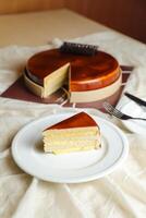 Mocha cake slice include chocolate, cream, sugar with knife and fork served in plate side view of cafe food photo