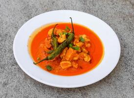 makhni chicken boneless handi served in dish isolated on background top view of indian spices and pakistani food photo