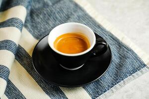 Espresso coffee include sugar, milk isolated on napkin top view cafe breakfast drink photo