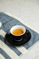 Espresso coffee include sugar, milk isolated on napkin top view cafe breakfast drink photo